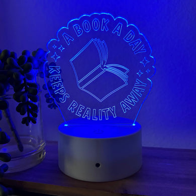 A Book A Day Keeps Reality Away Desk Lamp